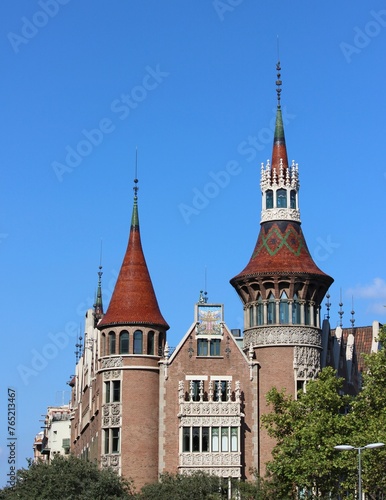 Casa Terrades, is a fascinating building in Barcelona known for its unique facade with six pointed towers, which earned it the name House of the Six Points