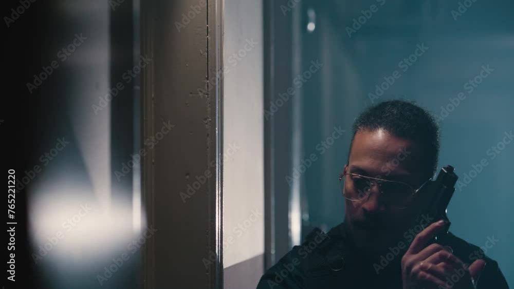 Action scene with cop breaching a door Action scene with cop breaching a door