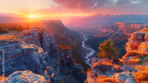 The sun sets over a canyon with a river, creating a beautiful natural landscape