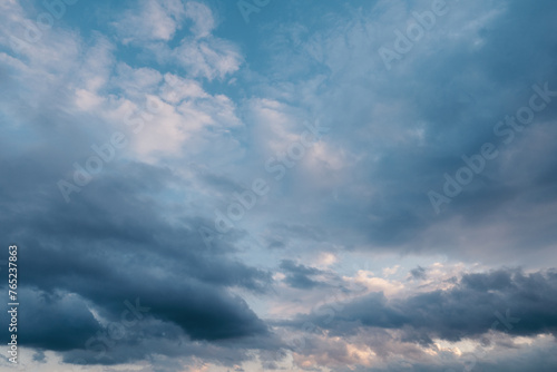 Blue sky with clouds at sunrise or sunset