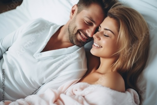 A loving couple shares a tender moment in bed, portraying intimacy, comfort, and a deep emotional connection. Couple in Love Enjoying Intimate Moment in Bed