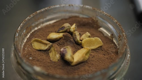 Close up view on tiramisu with pistachios