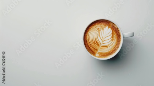 Crisp and detailed image of a cappuccino on a pristine white surface photo