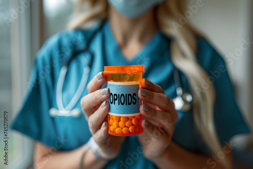 Nurse holding a full pill bottle with a label that says OPIOIDS