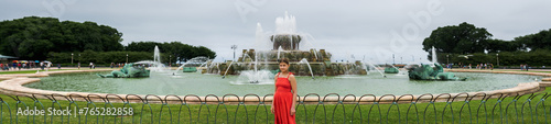 woman standing in front of fountain