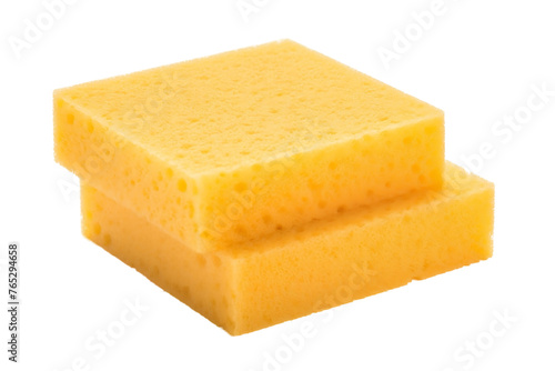 This image depicts a sponge diligently scrubbing a surface against a clean white backdrop, showcasing its role in removing dirt and grime.