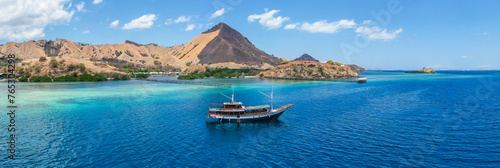Panorama view of beaches and tourist boat sailing in Flores Island, Indonesia