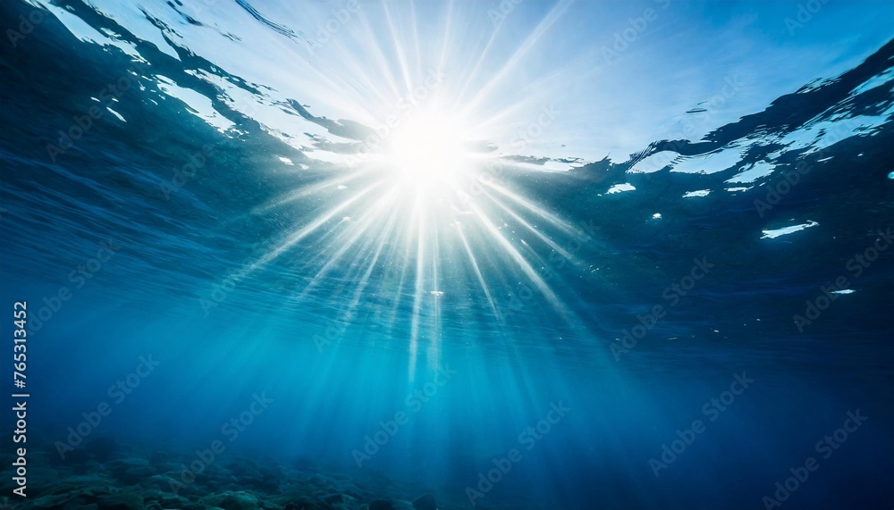 sun shining light in blue clearly deep water sunbeams illuminate the blue underwater sea scene background