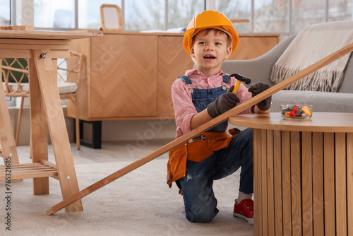 Cute little builder hammeri...
