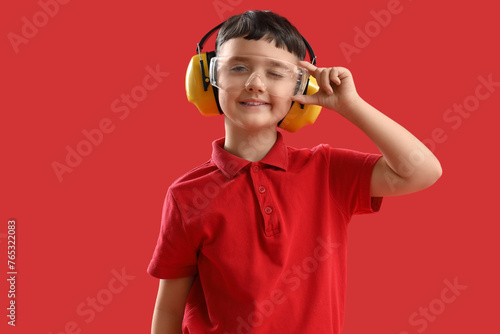 Cute little builder in safe...