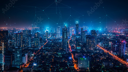 Panorama aerial view in the cityscape skyline with smart services and icons, internet of things, networks and augmented reality concept , night scene . © Wasin Arsasoi