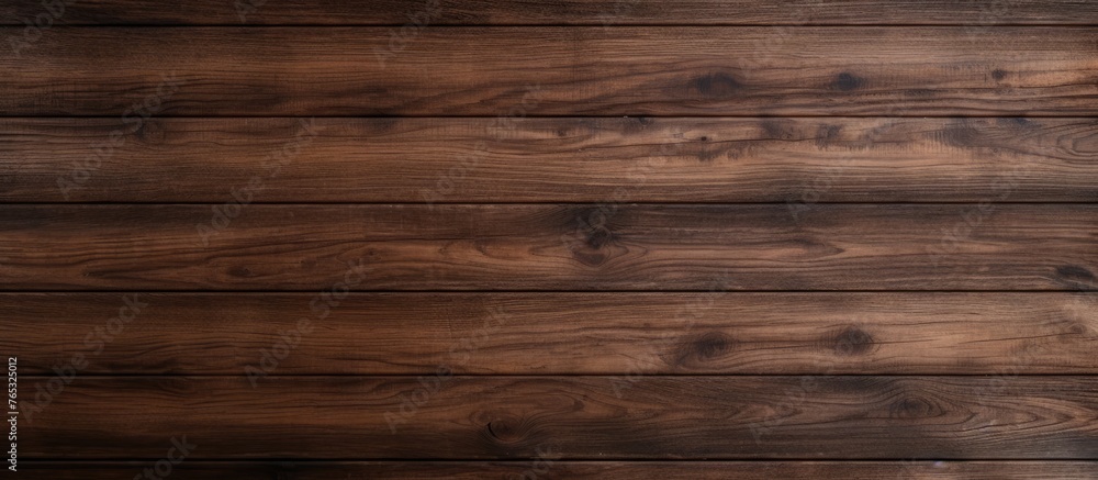 A detailed view of a wooden wall featuring a brown stain on its surface A detailed view of a wooden wall featuring a brown stain on its surface