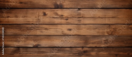 Detailed view of a wooden wall with a dark brown stain