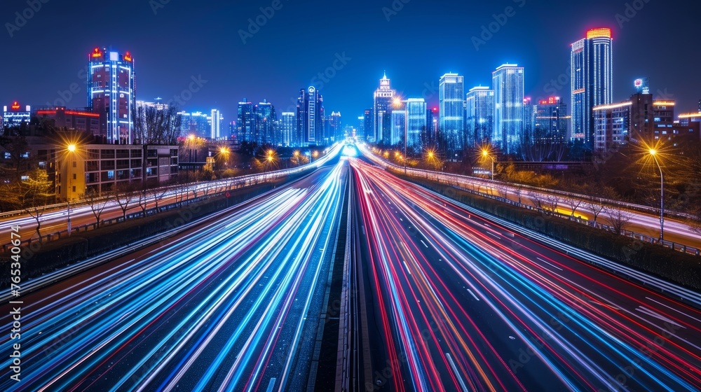 Urban night traffic  blurred cars in motion on illuminated highways with long exposure light trails