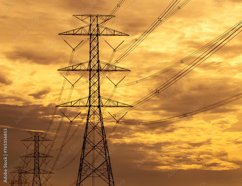 High voltage tower with sunset background