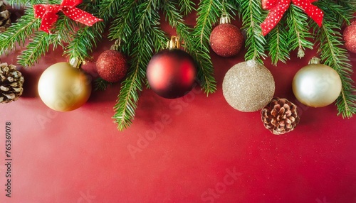 red christmas background with fir ornaments and holiday gifts