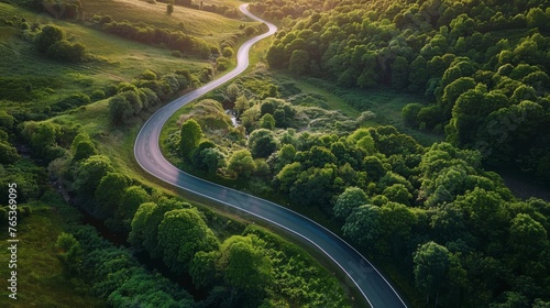 A road winding through a serene countryside,  symbolizing the simplicity and focus needed for startups to succeed amidst distractions photo