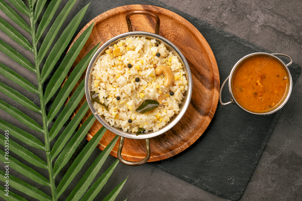 Fresh made Ven Pongal with Sambar served as a break fast in tamilnadu. Fresh pongal with sambar main break fast and dinner south indian dish