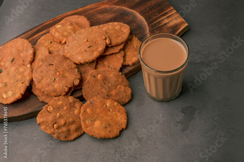 Thattai or Nippattu or Chekkalu is a south Indian deep fried snack made with rice flour and daily common tea time snack.  Thattai is a south Indian fried snack, Spicy and Crispy with karak chai