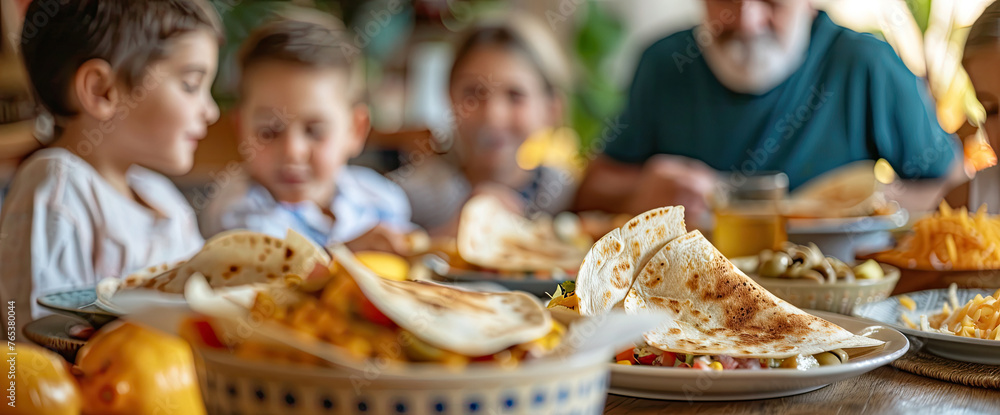 Generations of Loved Ones Gather Around the Table, Savoring a Homemade Mexican Quesadilla - A Nostalgic Family Gathering Full of Memories and Comfort