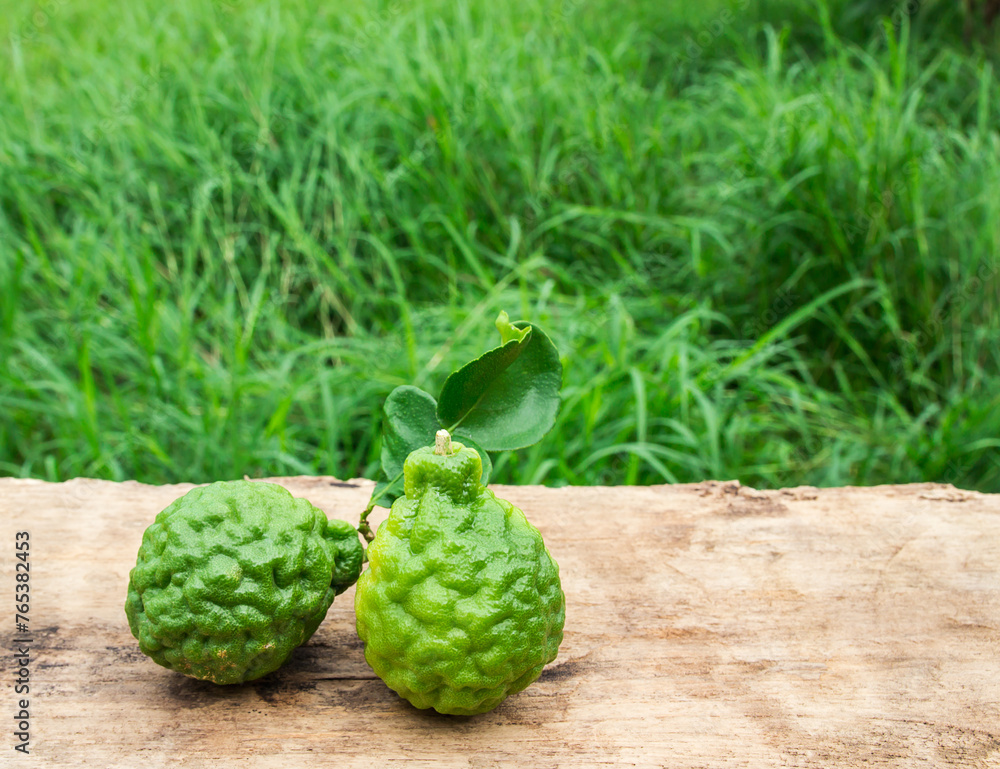 Close up image of bergamot on wooden Close up image of bergamot on wooden