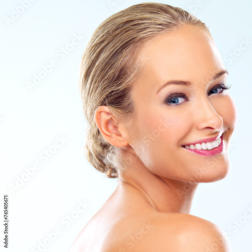 Portrait  makeup and smile of woman for skincare  glow or shine for health isolated on a white studio background mockup space. Face  beauty and happy blonde model in cosmetics for facial dermatology