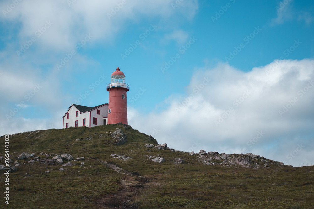 Lighthouse in Ferryland, Newfoundland on a cloudy day