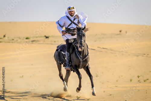 Arabian horseback archer riding his stallion and aiming at targets with his bow and arrow