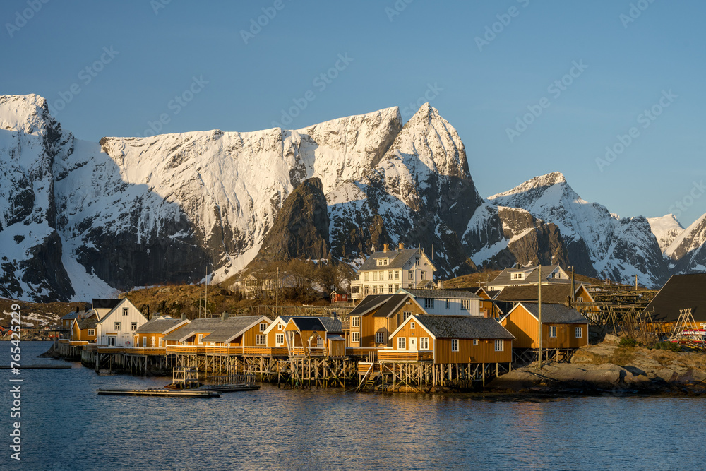 The sunrise view point with SAKRISOY village with snow mountain on Lofoten island,Norway 