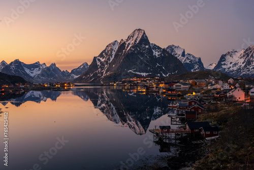 Reine city view point with a beautiful reflection on the sunset view.  © Peerawat