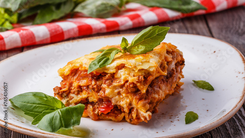 Traditional lasagna made with minced beef bolognese sauce © tbralnina