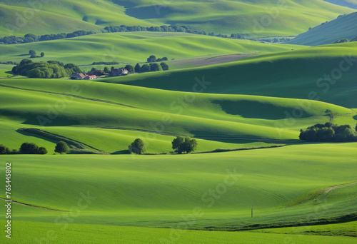 Endless Green Fields  panoramic landscape with green rolling hills in spring sunny morning colorful background
