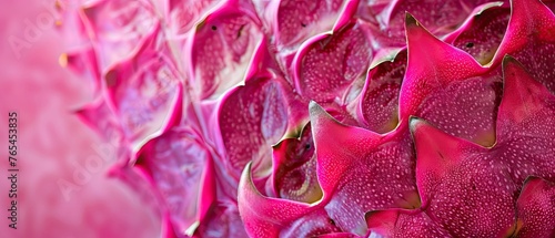 Texture of a ripe dragon fruit skin with its unique scale-like appearance against a contrasting vibrant pink © 220 AI Studio