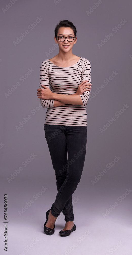 Crossed arms, fashion and portrait of business woman in studio with company pride, confidence and smile. Creative startup, professional and isolated person for career, work and job on gray background Crossed arms, fashion and portrait of business woman in studio with company pride, confidence and smile. Creative startup, professional and isolated person for career, work and job on gray background