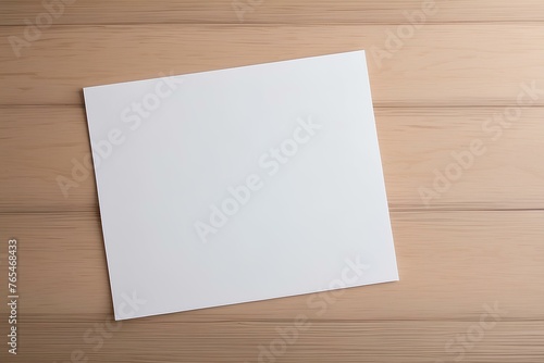 blank paper on wooden background, copy space, space for text and design 