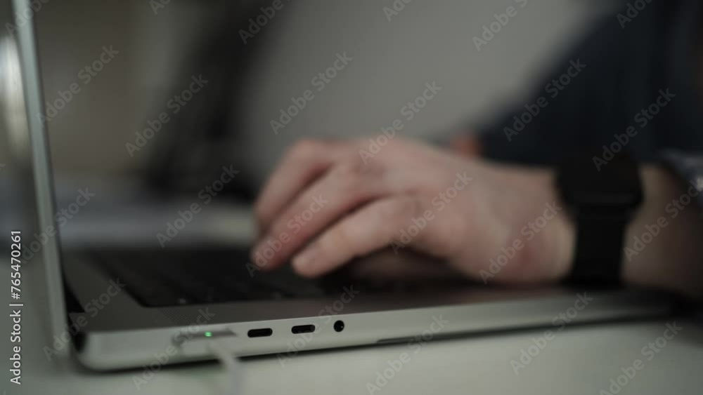 Man working on laptop on the table Man working on laptop on the table
