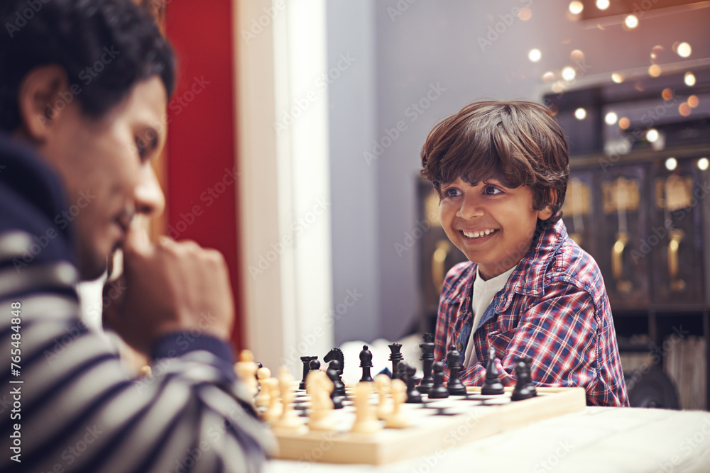 Child, father and smile for chess strategy or planning checkmate move with knight, king or queen. Son, parent and pawn competition learning or decision thoughts or playing, contest or problem solving Child, father and smile for chess strategy or planning checkmate move with knight, king or queen. Son, parent and pawn competition learning or decision thoughts or playing, contest or problem solving