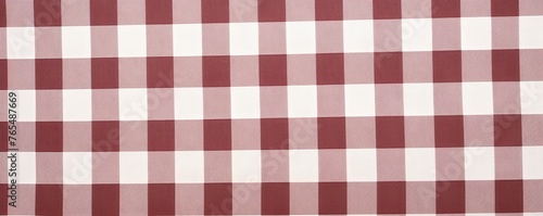 The gingham pattern on a burgundy and white background