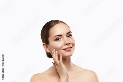 Woman Face Skin Care. Closeup Beautiful Sexy Woman With Perfect Professional Makeup Touching Her Smooth Soft Pure Clean Skin. Attractive Female Model Caressing Face. Beauty Cosmetics.