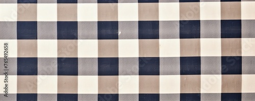 The gingham pattern on a navy blue and white background