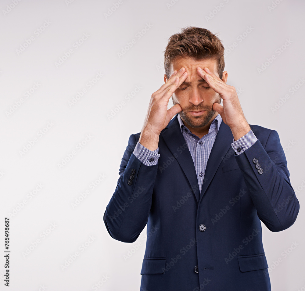 Entrepreneur, man and studio with stress or headache for company, deadline and corporate person on white background. Frustrated, businessman and work for start up business in suit and professional Entrepreneur, man and studio with stress or headache for company, deadline and corporate person on white background. Frustrated, businessman and work for start up business in suit and professional