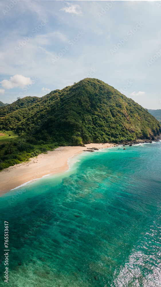 Discovering the Beauty of Pantai Selong Belanak Beach: A Bird's Eye View from Drone Perspective over Lombok Island, Indonesia