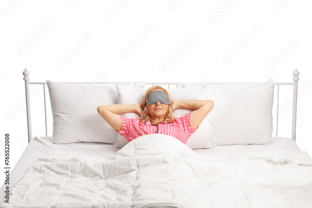 Woman resting in a bed with mask over eyes