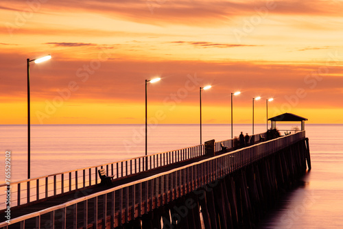 Silhouette showing the structure of the Grange Jetty in Gulf St Vincent photo