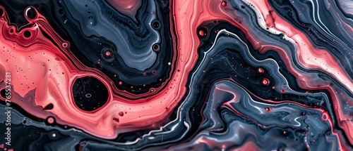  Close-up of a multicolor liquid swirl with droplets of water on the left