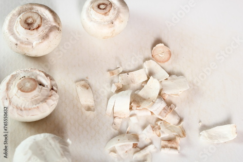 Peeling Mushrooms. Making Chicken, Cheese and Leek Parcel Series. © ffolas