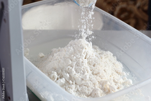 Weighing Flour. Making Treacle Pie Series. © ffolas