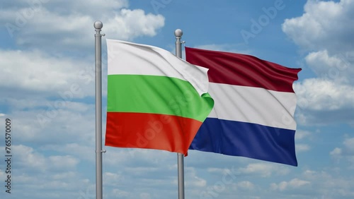 Netherlands and Bulgaria two flags waving together, looped video, two country relations concept photo
