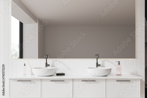 White bathroom interior with double sink