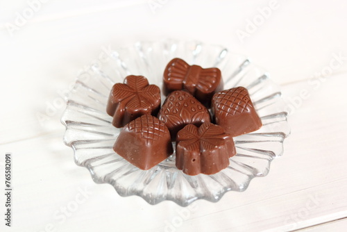 Chocolate Pralines on glass plate
